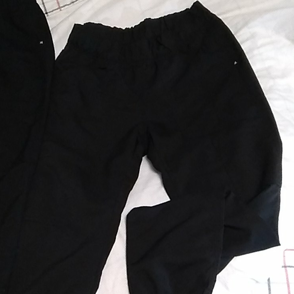 2 pairs of black scrub pants